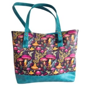 tote bag featuring a teal and mushroom faux leather