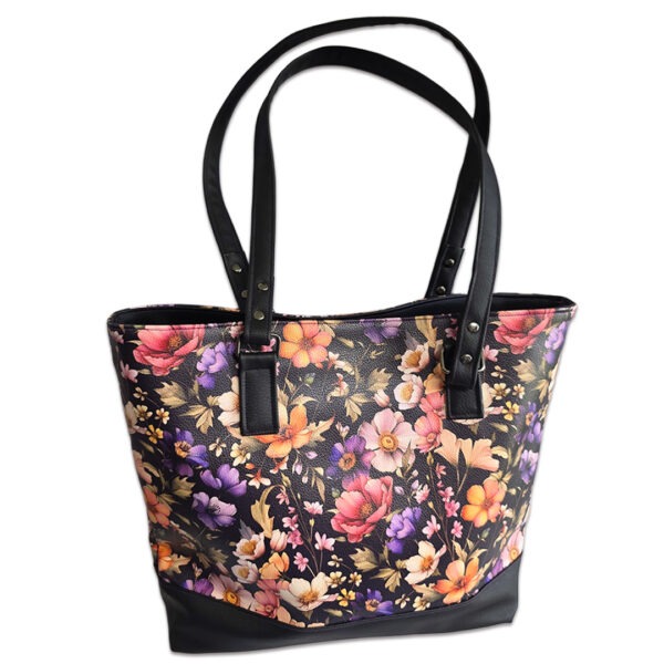 tote bag featuring colorful purple peach, pink flowers with black accent. handmade with faux leather