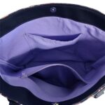tote bag featuring colorful flowers with black accent and purple lining. handmade with faux leather